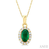 5x3 MM Oval Shape Emerald and 1/20 Ctw Single Cut Diamond Halo Precious Pendant with Chain in 14K Yellow Gold