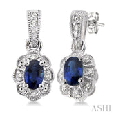 5x3 MM Oval Cut Sapphire and 1/20 Ctw Single Cut Diamond Earrings in Sterling Silver
