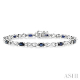 5x3 MM Oval Cut Sapphire and 1/10 Ctw Single Cut Diamond Bracelet in 10K White Gold