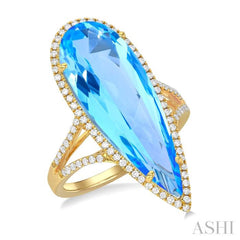 26x9 MM Pear Shape Blue Topaz and 1/3 Ctw Round Cut Diamond Halo Semi-Precious Ring in 14K Yellow Gold