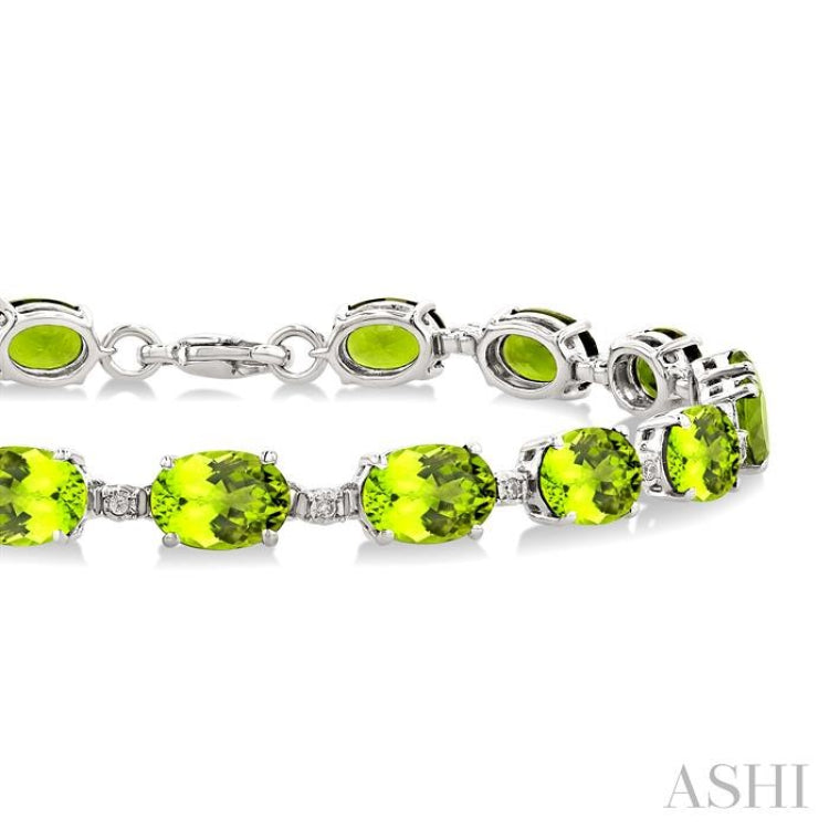 7X5 MM Oval Shape Peridot and 1/10 Ctw Single Cut Diamond Semi-Precious Bracelet in Sterling Silver