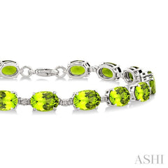 7X5 MM Oval Shape Peridot and 1/10 Ctw Single Cut Diamond Semi-Precious Bracelet in Sterling Silver