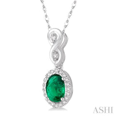 6x4 MM Oval Cut Emerald and 1/10 Ctw Round Cut Diamond Pendant in 14K White Gold with Chain