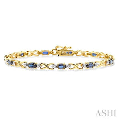 5x3 MM Oval Cut Sapphire and 1/10 Ctw Single Cut Diamond Bracelet in 10K Yellow Gold