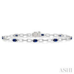 5x3 MM Oval Cut Sapphire and 1/6 Ctw Round Cut Diamond Precious Bracelet in 10K White Gold