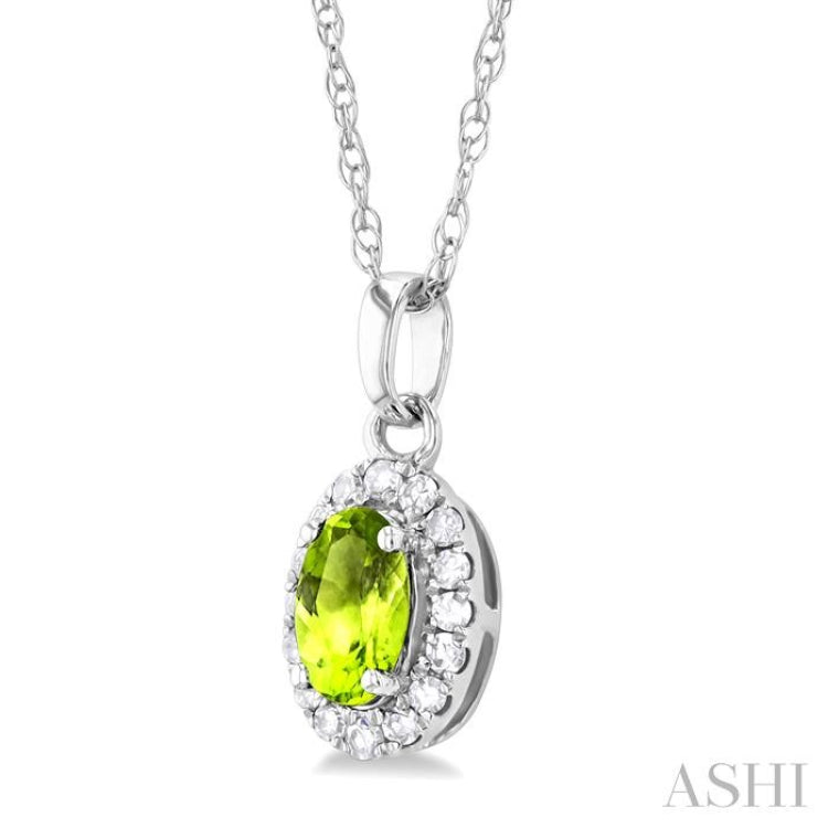 5x3 MM Oval Shape Peridot and 1/20 Ctw Single Cut Diamond Halo Semi-Precious Pendant with Chain in 10K White Gold