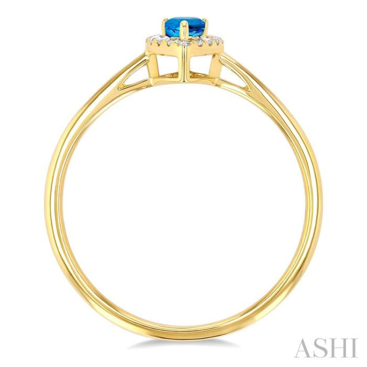 5x3 MM Pear Shape Blue Topaz and 1/20 Ctw Single Cut Diamond Halo Semi-Precious Ring in 10K Yellow Gold