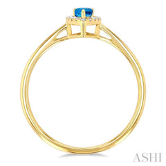 5x3 MM Pear Shape Blue Topaz and 1/20 Ctw Single Cut Diamond Halo Semi-Precious Ring in 10K Yellow Gold