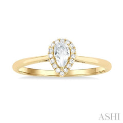 5x3 MM Pear Shape White Topaz and 1/20 Ctw Single Cut Diamond Halo Semi-Precious Ring in 14K Yellow Gold