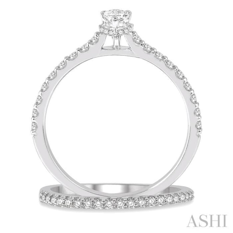 3/4 Ctw Diamond Wedding Set With 5/8 Ct Pear Cut Diamond Engagement Ring and 1/6 Ct Wedding Band in 14K White Gold