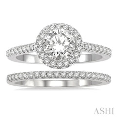7/8 Ctw Round Cut Diamond Wedding Set With 3/4 Ctw Round Cut Engagement Ring and 1/6 Ctw Wedding Band in 14K White Gold