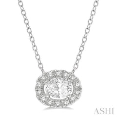 1/4 Ctw Oval and Round Cut Diamond Halo Fashion Petite Pendant With Chain in 14K White Gold
