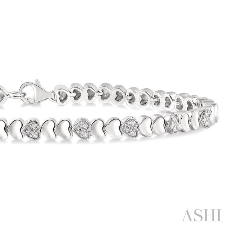 1/6 Ctw Puffed Heart Plain and Single Cut Diamond Fashion Bracelet in Sterling Silver