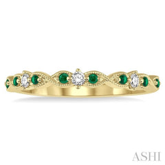 1.25 MM Emerald and 1/10 Ctw Round Cut Diamond Precious Wedding Band in 14K Yellow Gold