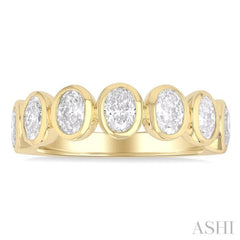 2 Ctw 7-Stone Bezel Set Oval Cut Diamond Fashion Band in 14K Yellow Gold