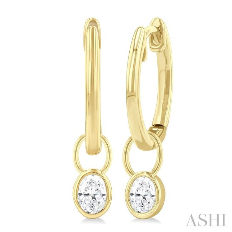 1/3 Ctw Bezel Set Oval Cut Diamond Huggie Earrings in 14K Yellow Gold