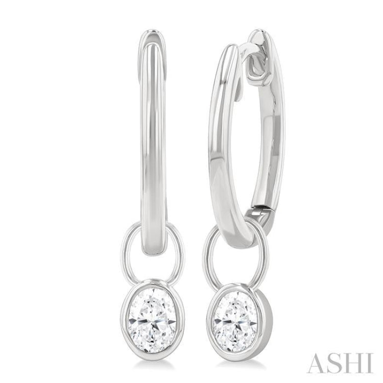 1/3 Ctw Bezel Set Oval Cut Diamond Huggie Earrings in 14K White Gold